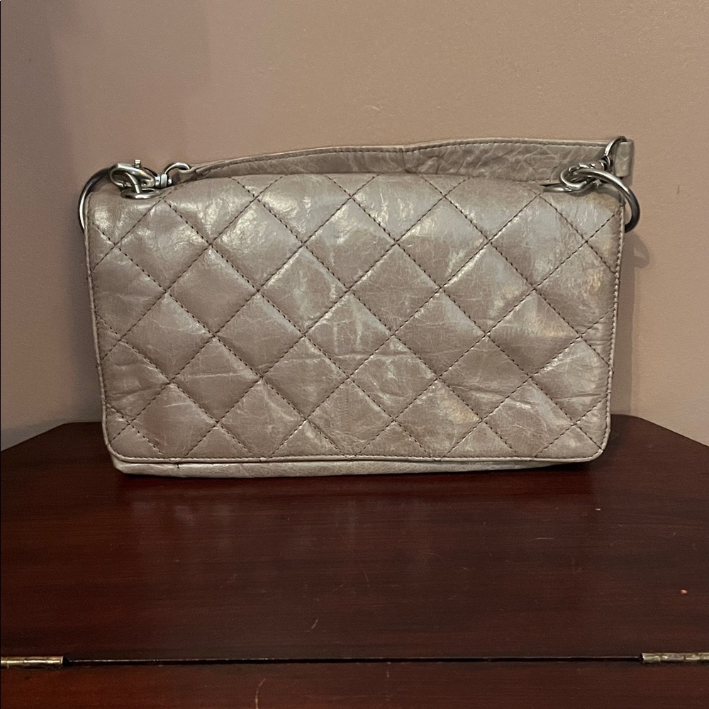 Hobo International clutch with removable 4”
Handle